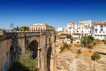 Fototapete Ronda Puente Nuevo Puente Nuevo und Gebäude auf den Klippen der Schlucht El Tajo in Ronda, Provinz Malaga, Spanien.