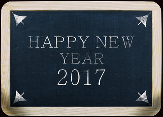Fototapeta premium new year 2017 handwritten notice on a slate