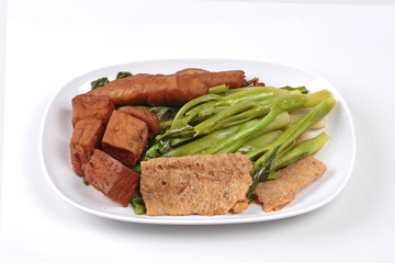 Chinese Vegetable festival  food as fried Kale with fermented flours. 
