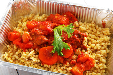 Healthy food in foil boxes, diet concept.