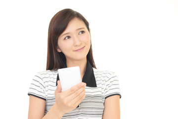Naklejka premium スマートフォンを持つ女性