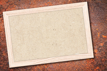 Fototapeta premium Chalkboard or Empty bulletin board with a wooden frame on brick wall background with copy space for text or image.