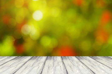 perspective white wood table empty space for text and nature abstract bokeh spring background