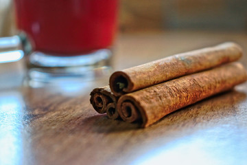 Cinnamon sticks and tea on a table