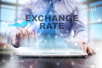 Businessman is using tablet computer, pressing button on touch screen and selecting 