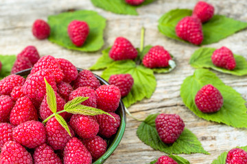 Fresh raspberries summer fruits in a bowl