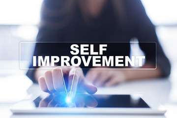 Woman is using tablet pc, pressing on virtual screen and selecting "Self improvement".