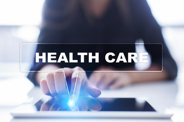 Woman is using tablet pc, pressing on virtual screen and selecting 