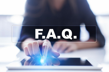 Woman is using tablet pc, pressing on virtual screen and selecting "F.A.Q.".