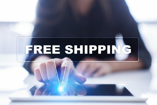 Woman is using tablet pc, pressing on virtual screen and selecting "Free shipping".