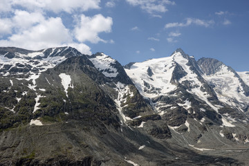 Fototapeta premium Peak of Grossglocker mountain with snow in summer time