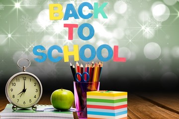 composite of back to school text with school materials