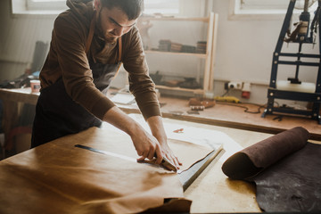 Master a man in an apron bake for skin products. Small business