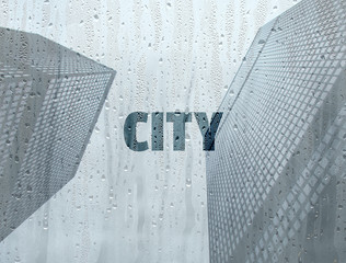 City written on a foggy window