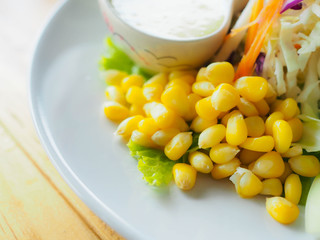 Tasty salad , tuna and vegetables on the plate