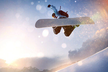 Snowboarder im Sprung - obrazy, fototapety, plakaty