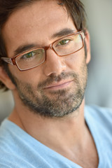 Portrait of 30-year-old man with eyeglasses on