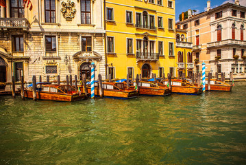 VENICE, ITALY - AUGUST 19, 2016: Retro brown taxi boat on water in Venice on August 19, 2016 in Venice, Italy.