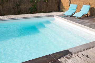 Beautiful pool in a garden in summer