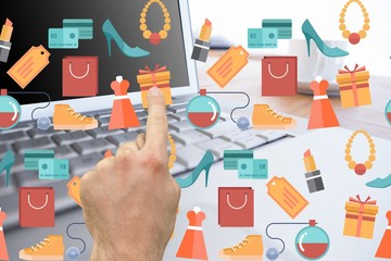 Hand touching shopping icons 