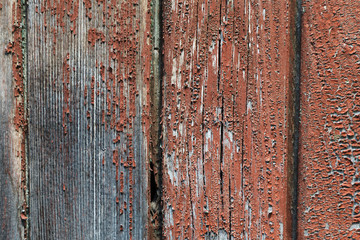 Textured background of old brown painted wooden boards