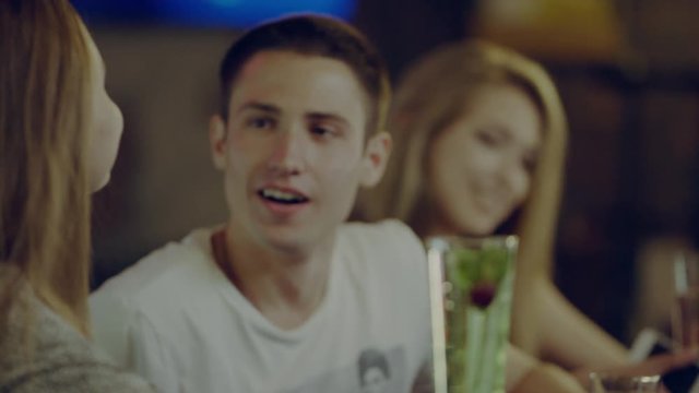 man talking to a woman