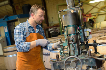 Cooper using machinery