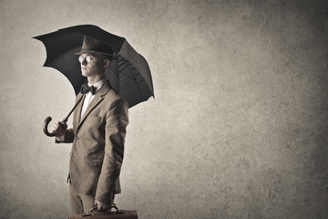 Elegant man with black umbrella