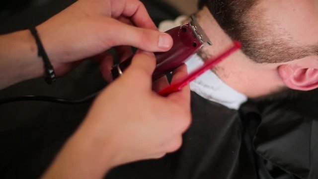 beard haircut in the barbershop.