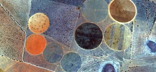 tribute to Miró,nature imitating art,abstract landscapes of deserts of Africa,Abstract Naturalism,abstract photography deserts of Africa from the air,abstract surrealism, forms of human work in desert - obrazy, fototapety, plakaty