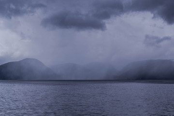 Fototapeta na wymiar Cloudy fjord 