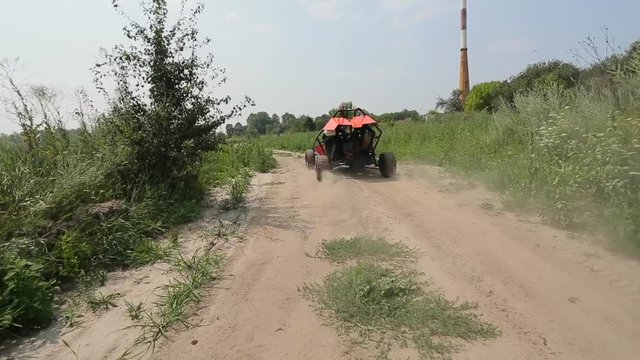 Buggy rides on the ground road.