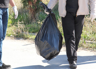 environmental activists collecting garbage