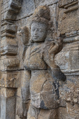Fototapeta na wymiar Ruins of the small Pawon temple complex, Java island, Indonesia