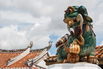 Chinese lion decorating temple in Malacca, Malaysia