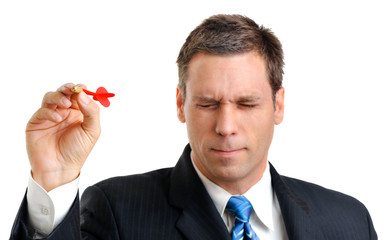 Businessman Throwing Dart on White