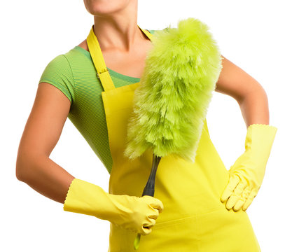 Heroic Maid Janitorial Service Woman In Yellow Apron And Rubber Gloves Holding Green Feather Duster Isolated On White Background For Use Alone Or As A Design Element