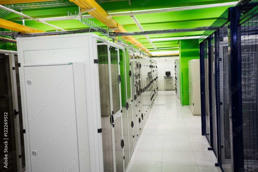 Poster hallway with a row of servers