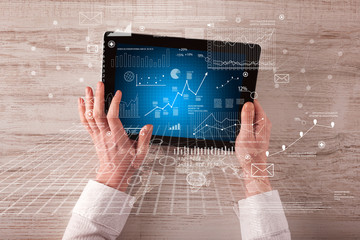 Business hands holding tablet