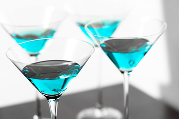 Four blue martinis