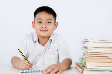 Asian Chinese Little Boy Wearing Student Uniform Writting Homewo