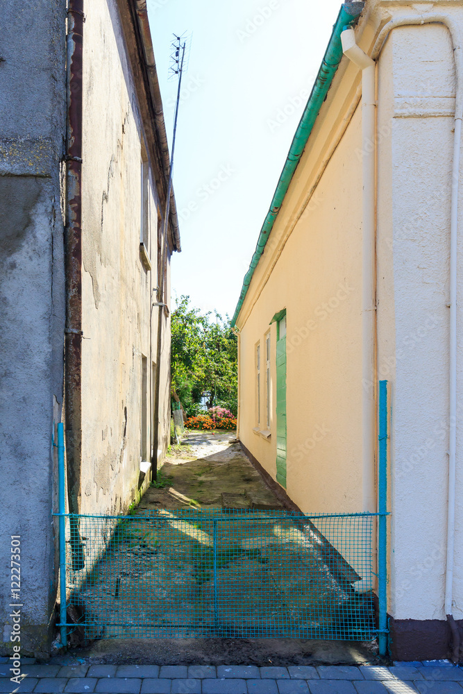 Wall mural passage between the house