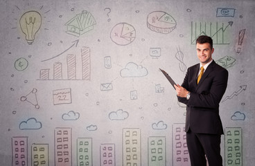 Obraz premium Colorful drawings on wall with businessman