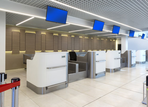 Empty check-in desks with computers