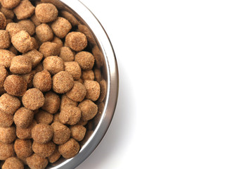 A bowl of dog food on a white background