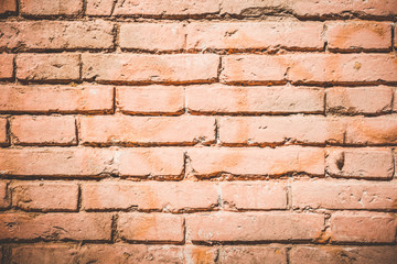 Brick wall building with red rough brick