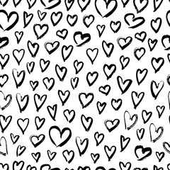 Seamless pattern with hand drawn ink grunge hearts on white back