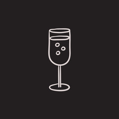 Glass of champagne sketch icon.