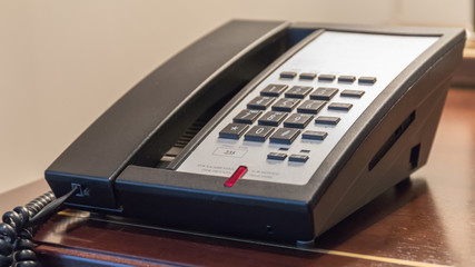 hotel phone on a desk
