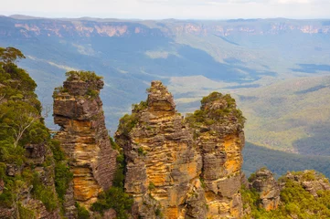 Papier Peint photo Trois sœurs The Three Sisters is a rock formation in the Blue Mountains of New South Wales, Australia, on the north escarpment of the Jamison Valley near Katoomba